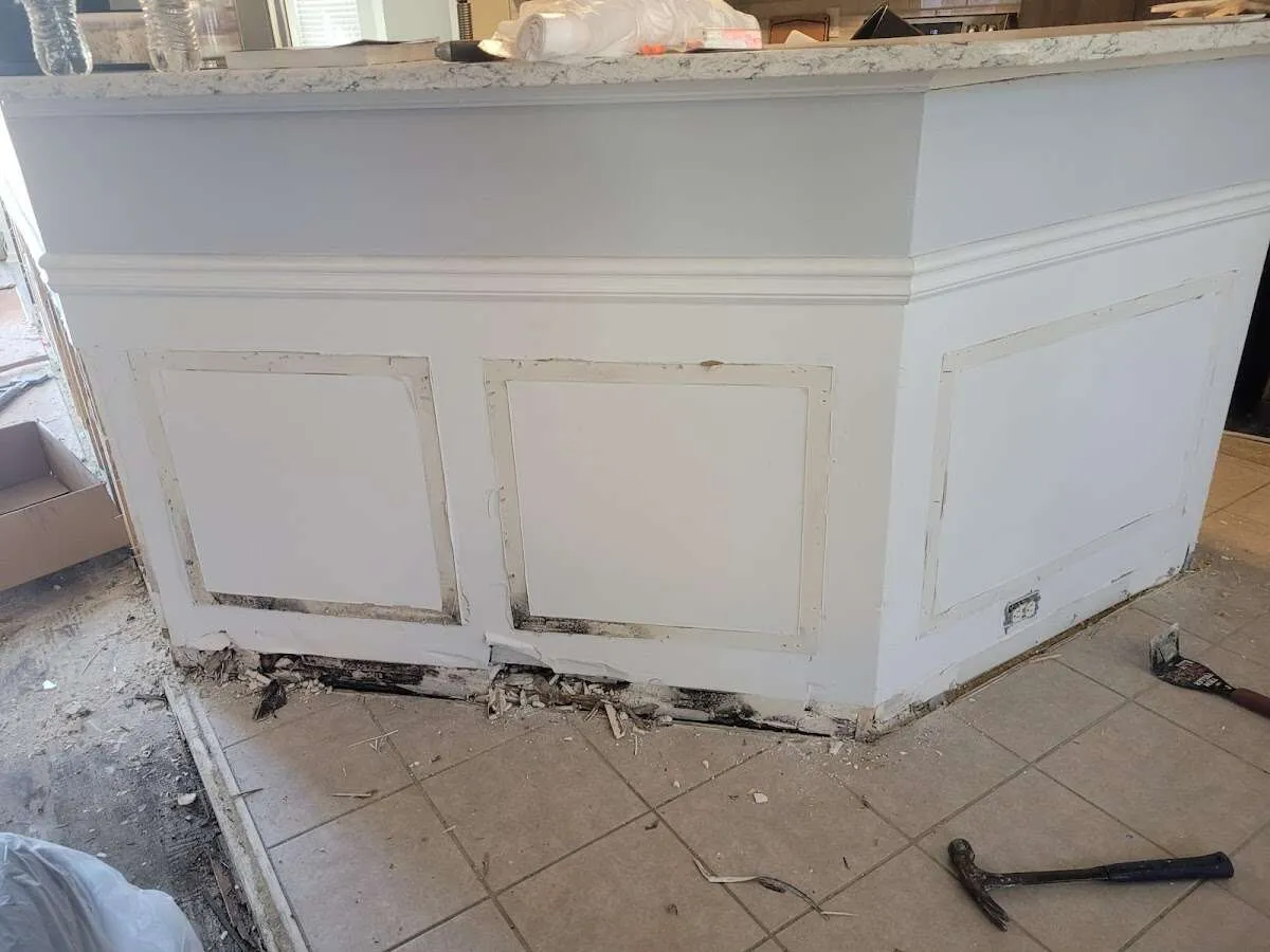 Water damage and mold on kitchen during Sewage Cleanup & Sanitation in Palos Verdes Estates
